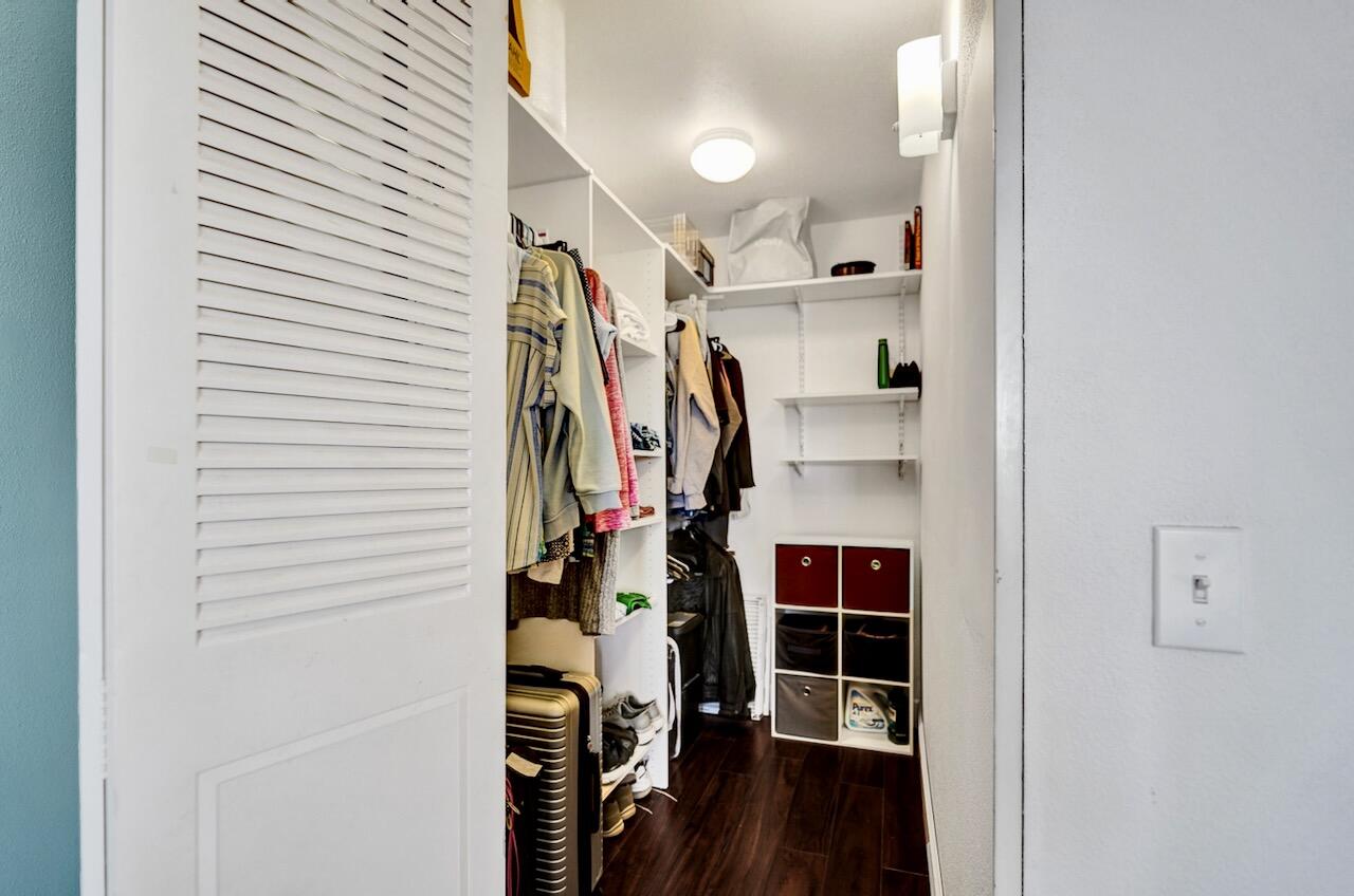 505 Monaco Way Delray Beach, FL 33446 - Photo 29 of 58 a view of walk in closet with clothes and shoes