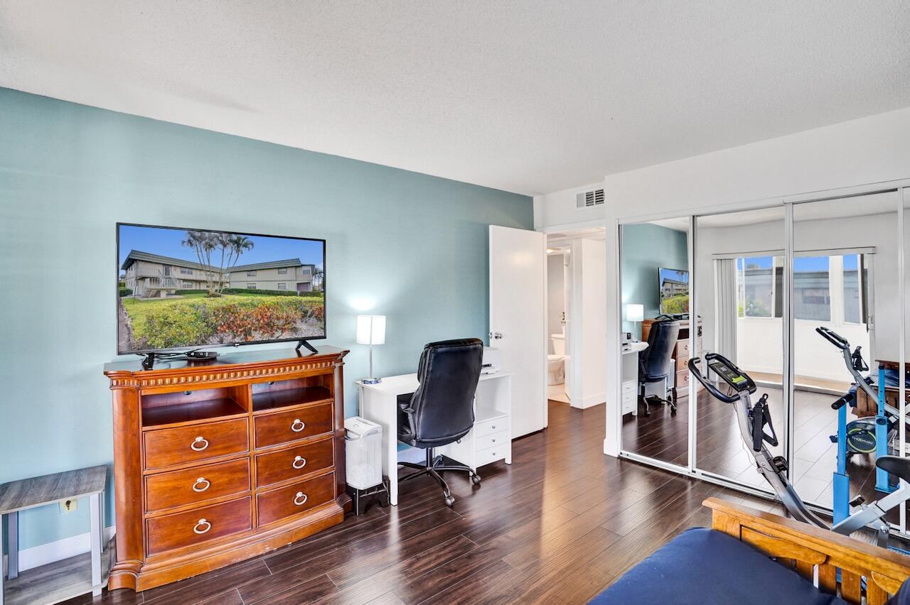 505 Monaco Way Delray Beach, FL 33446 - Photo 35 of 58 a view of a livingroom with furniture and a flat screen tv