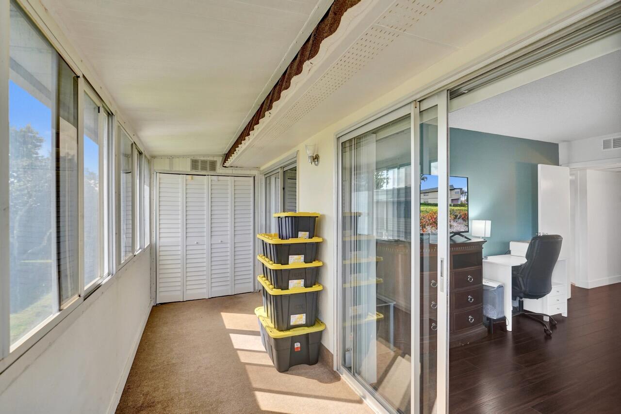 505 Monaco Way Delray Beach, FL 33446 - Photo 39 of 58 a view of entryway with furniture and wooden floor