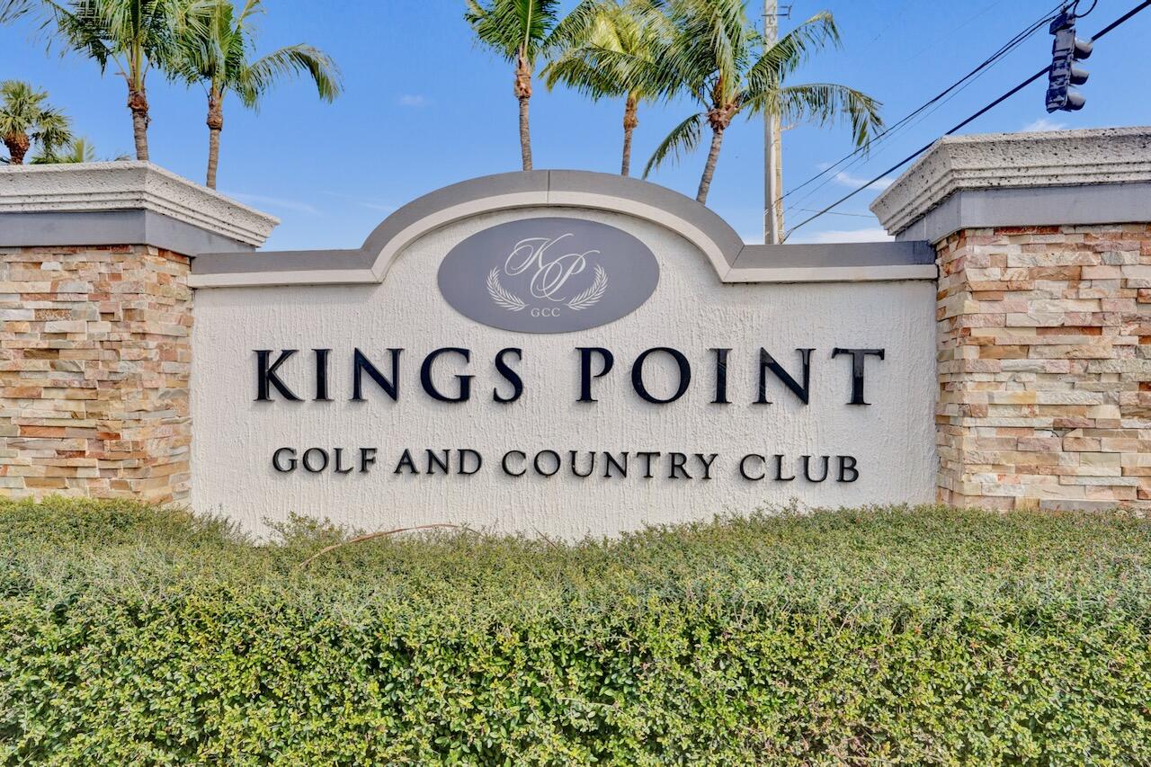 505 Monaco Way Delray Beach, FL 33446 - Photo 46 of 58 a sign broad on the wall