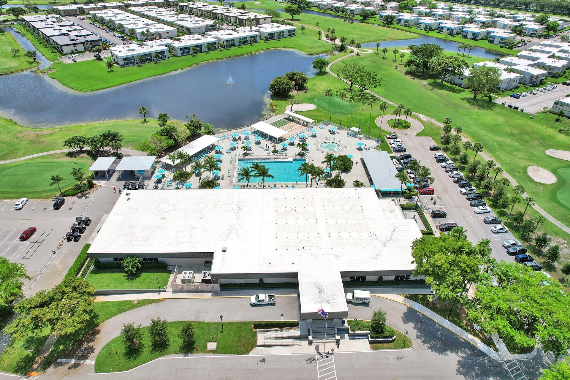 505 Monaco Way Delray Beach, FL 33446 - Photo 50 of 58 an aerial view of multiple houses with yard