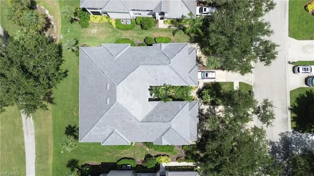an aerial view of a house with a garden