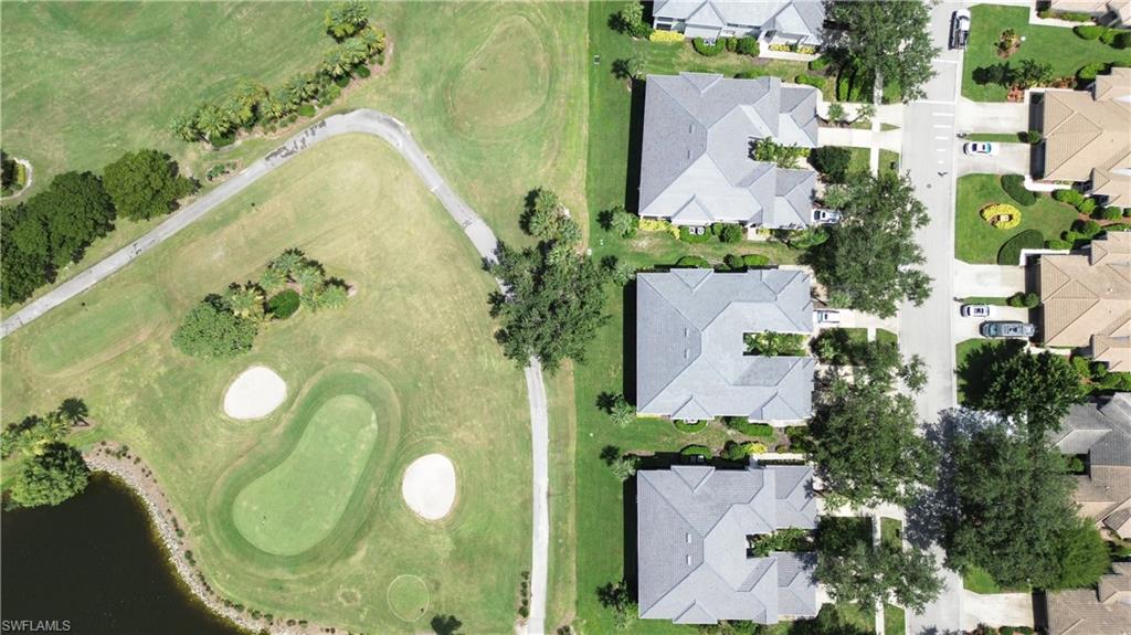 1937 Crestview Way, Unit 171 Naples, FL 34119 - Photo 31 of 39 an aerial view of a swimming pool