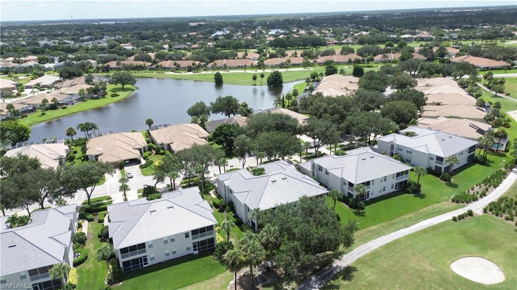 1937 Crestview Way, Unit 171 Naples, FL 34119 - Photo 32 of 39 an aerial view of a house with outdoor space
