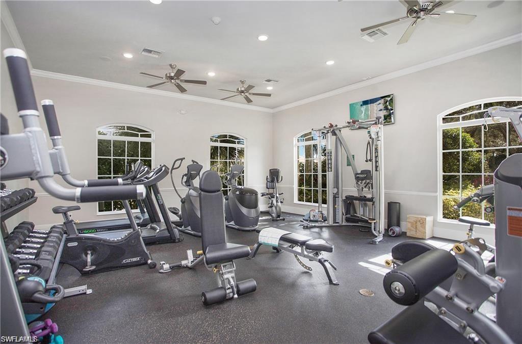 1937 Crestview Way, Unit 171 Naples, FL 34119 - Photo 36 of 39 a view of a room with gym equipment