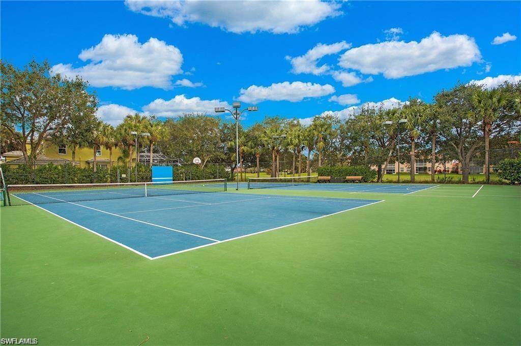 1937 Crestview Way, Unit 171 Naples, FL 34119 - Photo 39 of 39 a view of a tennis court