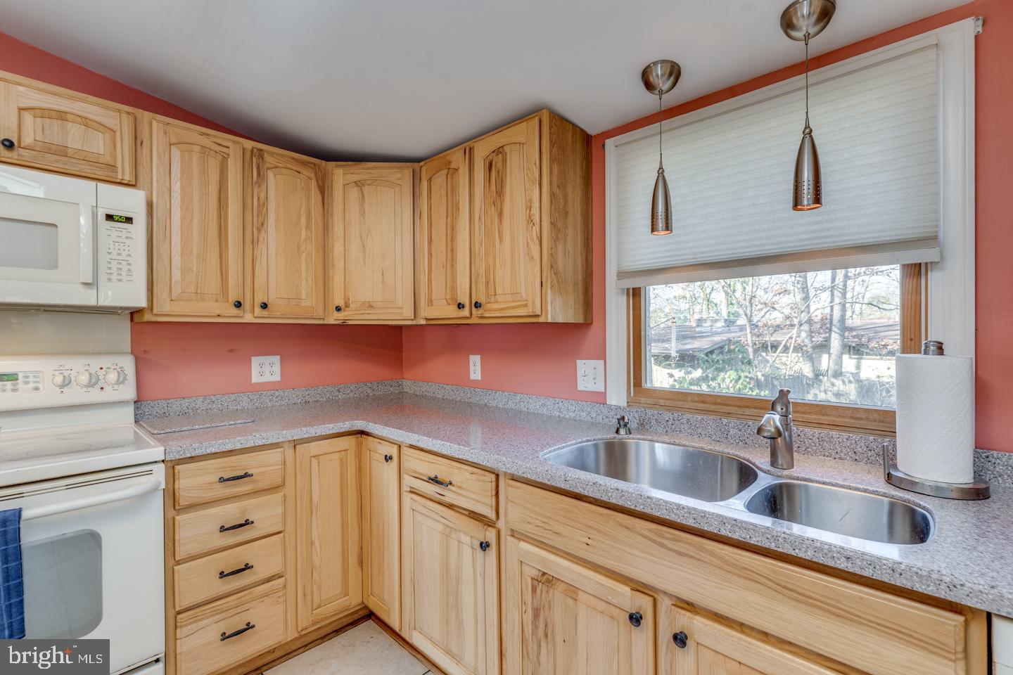 7 Forest Avenue Medford, NJ 08055 - Photo 14 of 43 a kitchen with cabinets appliances a sink and a window