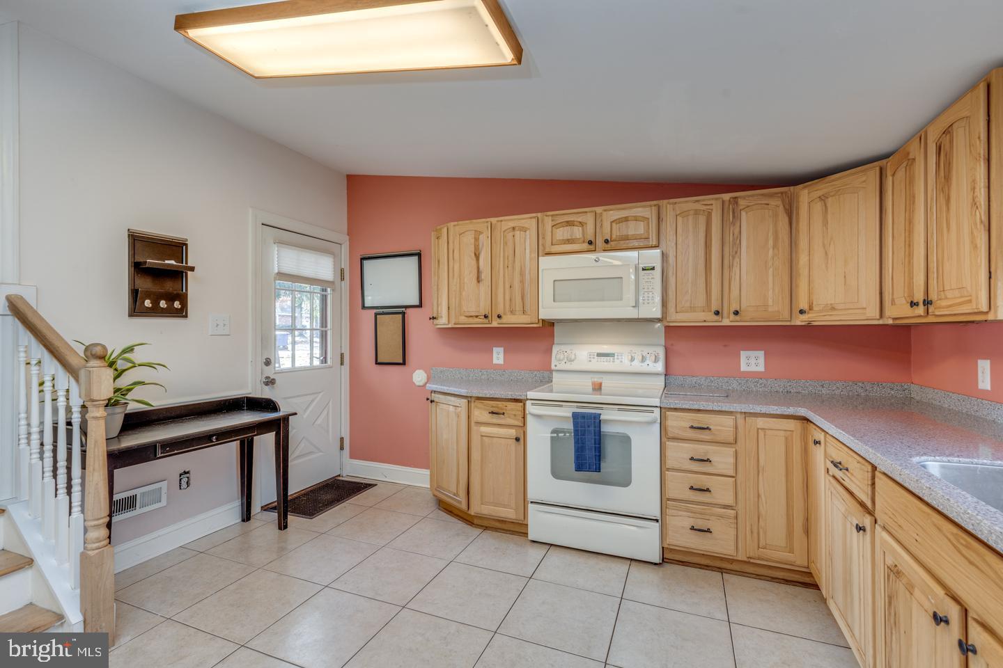 7 Forest Avenue Medford, NJ 08055 - Photo 16 of 43 a kitchen with stainless steel appliances granite countertop a stove and a sink