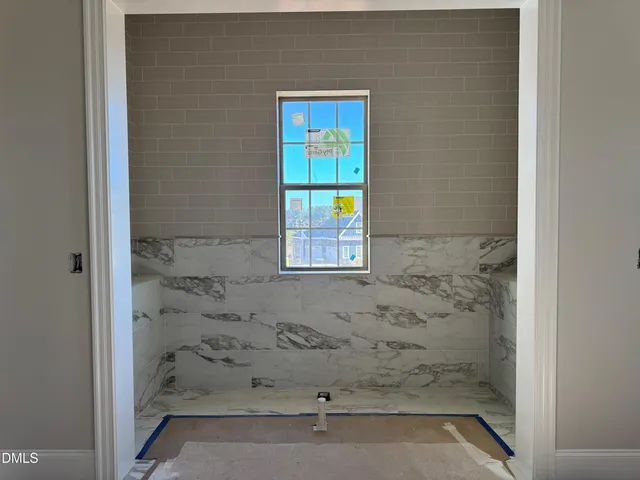a black and white photo of a living room