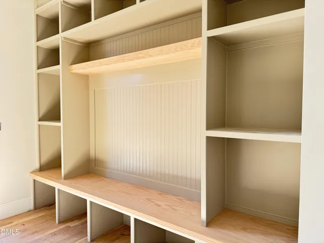 a picture of a bench in a white cabinet