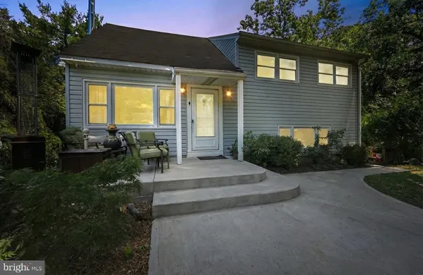 a house view with a garden space