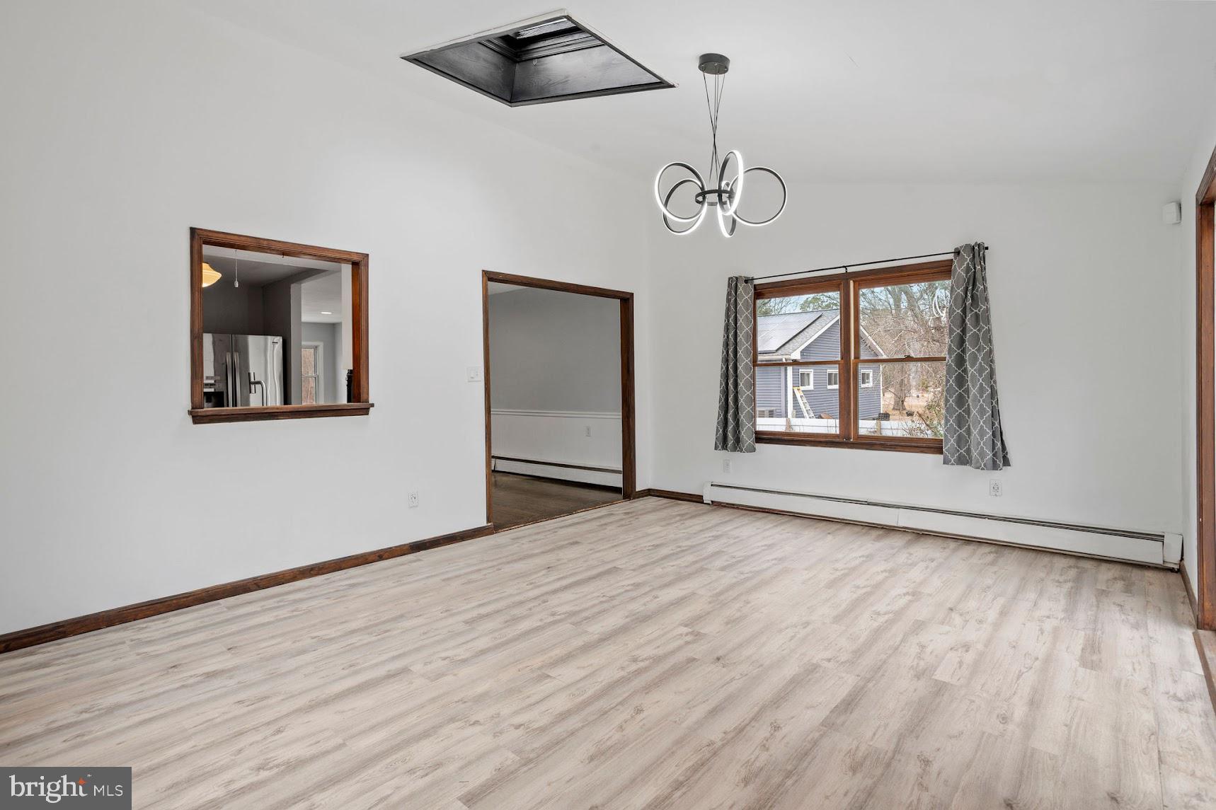 26 Worrell Road Tabernacle, NJ 08088 - Photo 13 of 39 a view of an empty room with wooden floor and windows