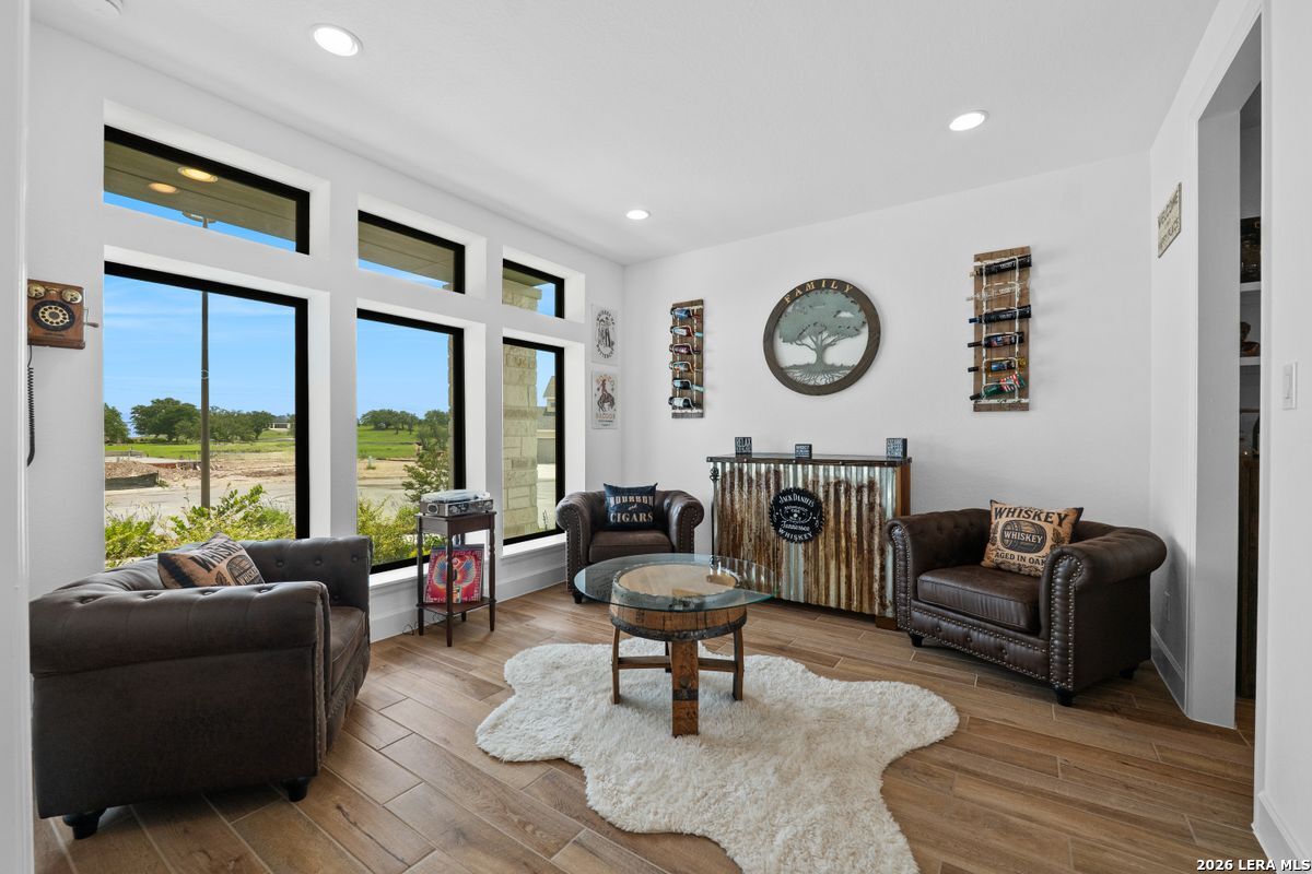 402 Fandango Boerne, TX 78006 - Photo 14 of 34 a living room with furniture and a large window