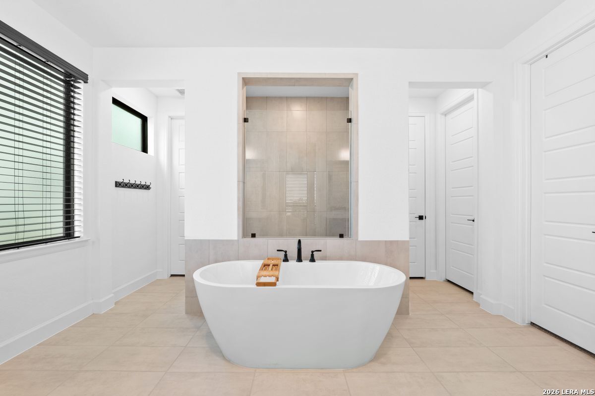 402 Fandango Boerne, TX 78006 - Photo 17 of 34 a white bath tub sitting in a bathroom