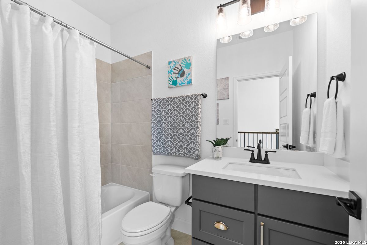 402 Fandango Boerne, TX 78006 - Photo 24 of 34 a bathroom with a sink toilet and shower
