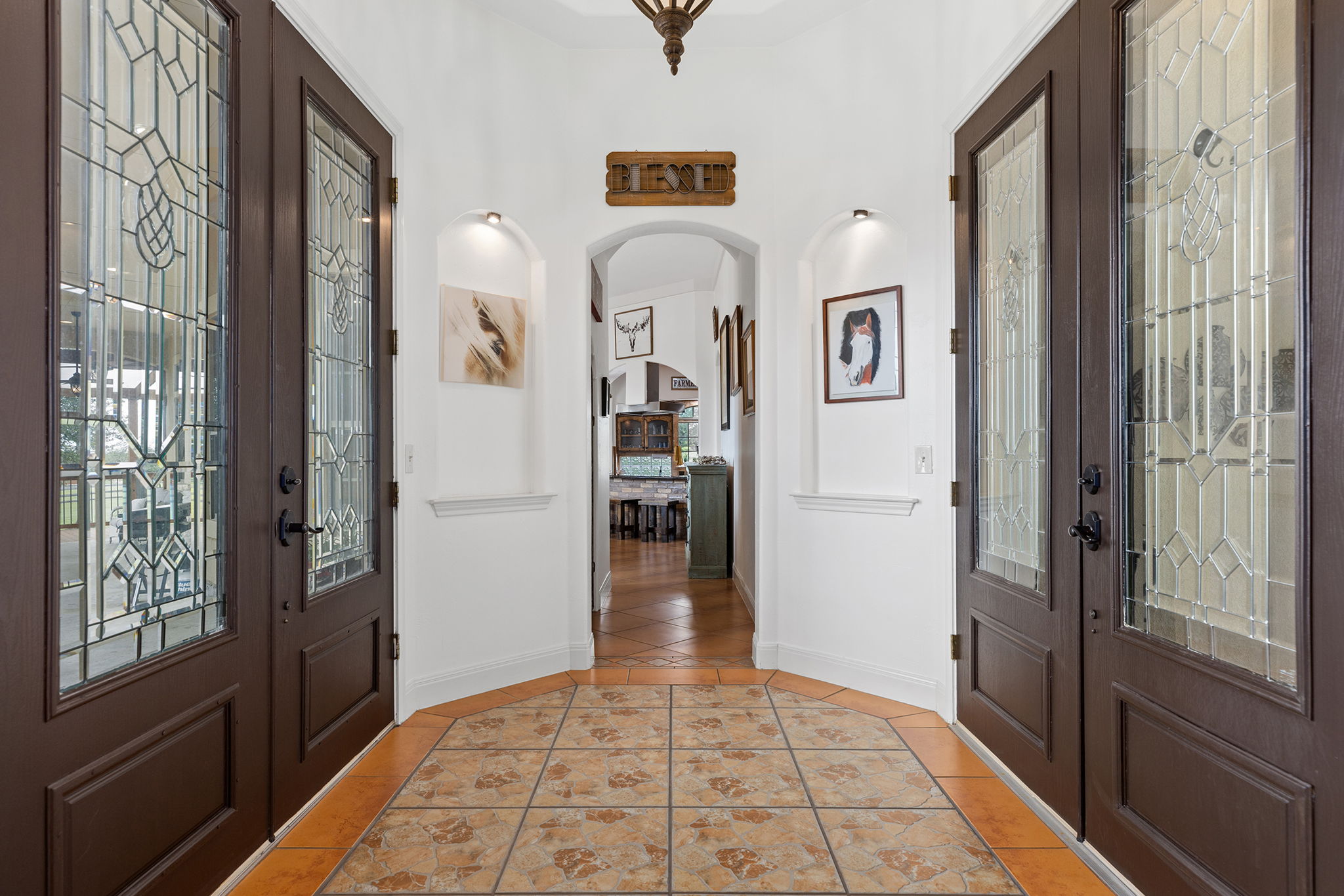 17308 St Therese Road Manor, TX 78653 - Photo 14 of 40 a view of a hallway to rooms and stairs
