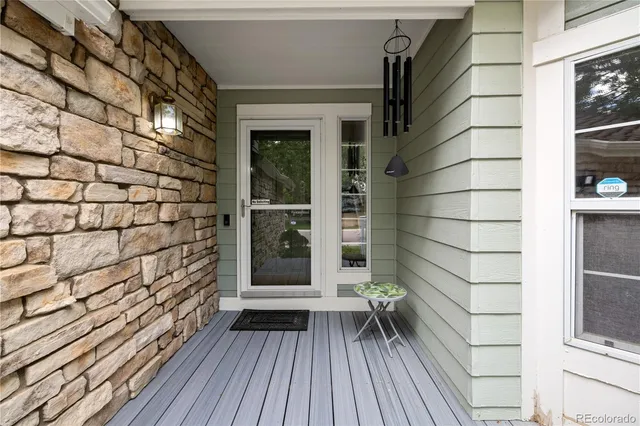 a view of outdoor space with deck and window