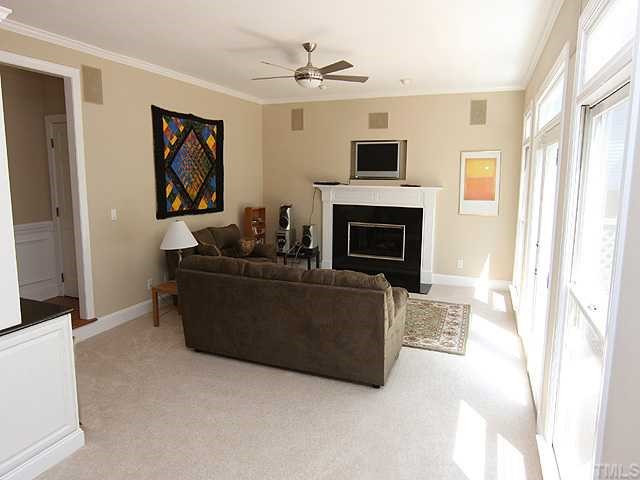 8905 Wildwood Links Raleigh, NC 27613 - Photo 4 of 11 Light and Bright Open Family Room with Surround Sound, Fireplace, Built-Ins plus new Carpet and Fresh Paint. Den/Family/Great Room