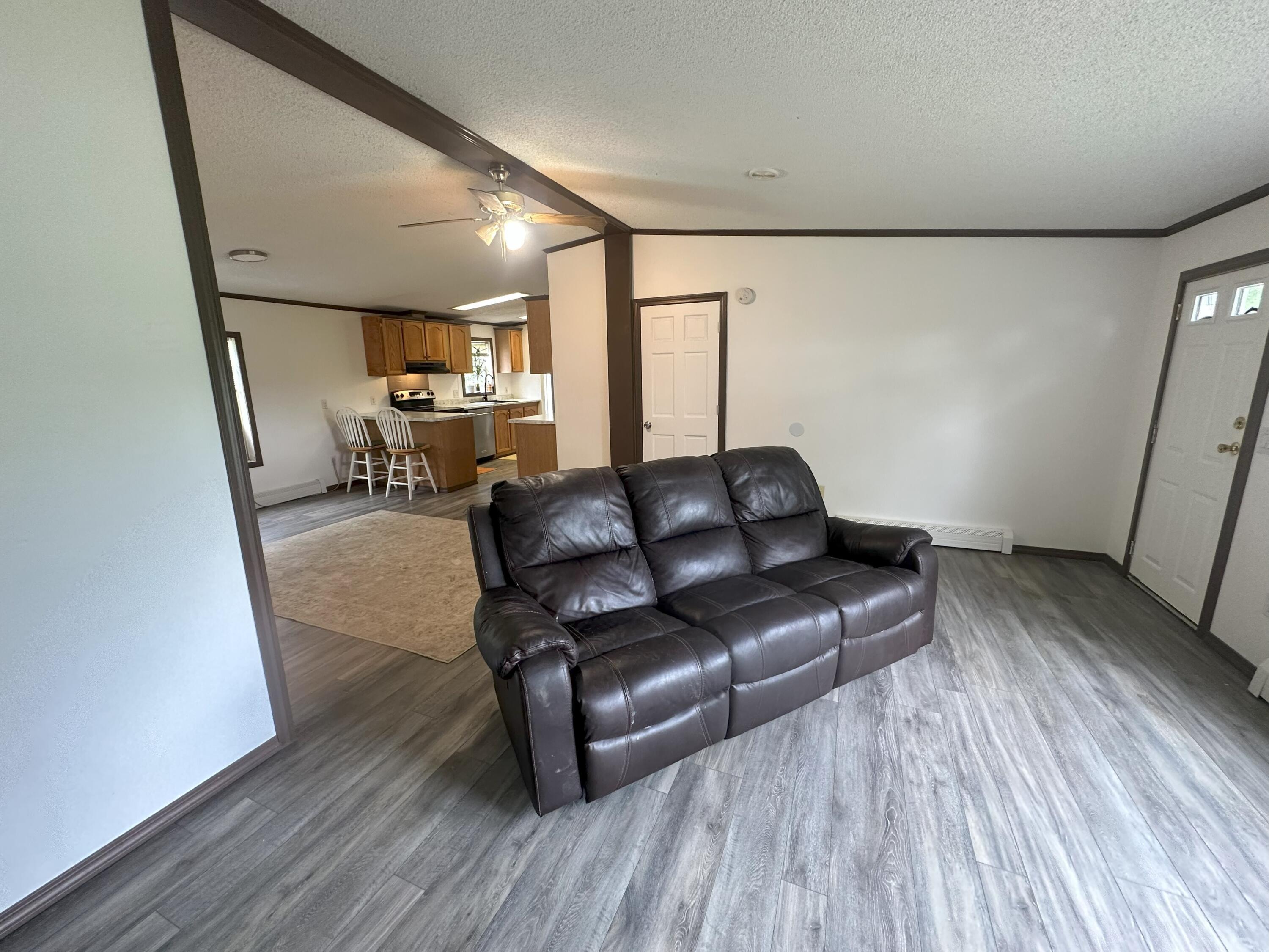 345 Wingood Road Windsor, ME 04363 - Photo 29 of 64 FacingLivingRoomFromBedroom