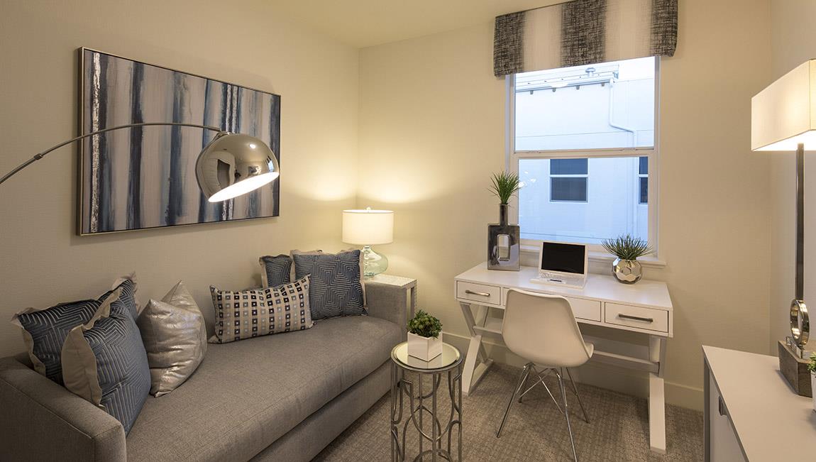 1653 Centre Pointe Drive Milpitas, CA 95035 - Photo 14 of 28 a living room with a couch and a table