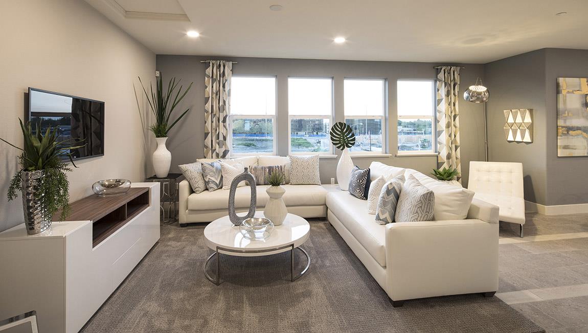 1653 Centre Pointe Drive Milpitas, CA 95035 - Photo 3 of 28 a living room with furniture and a flat screen tv