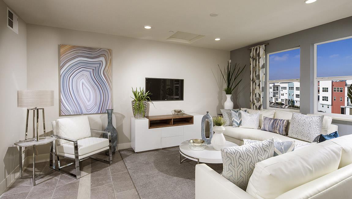 1653 Centre Pointe Drive Milpitas, CA 95035 - Photo 6 of 28 a living room with furniture and a flat screen tv