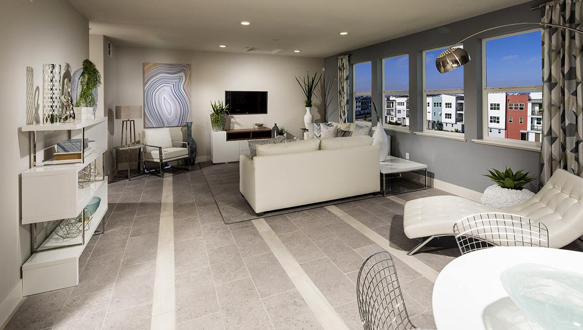 1653 Centre Pointe Drive Milpitas, CA 95035 - Photo 7 of 28 a living room with furniture and a flat screen tv