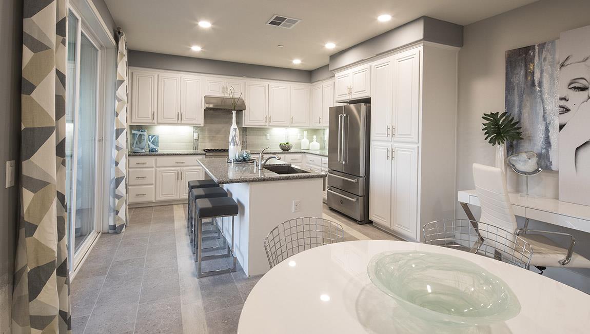 1653 Centre Pointe Drive Milpitas, CA 95035 - Photo 10 of 28 a kitchen with refrigerator and cabinets