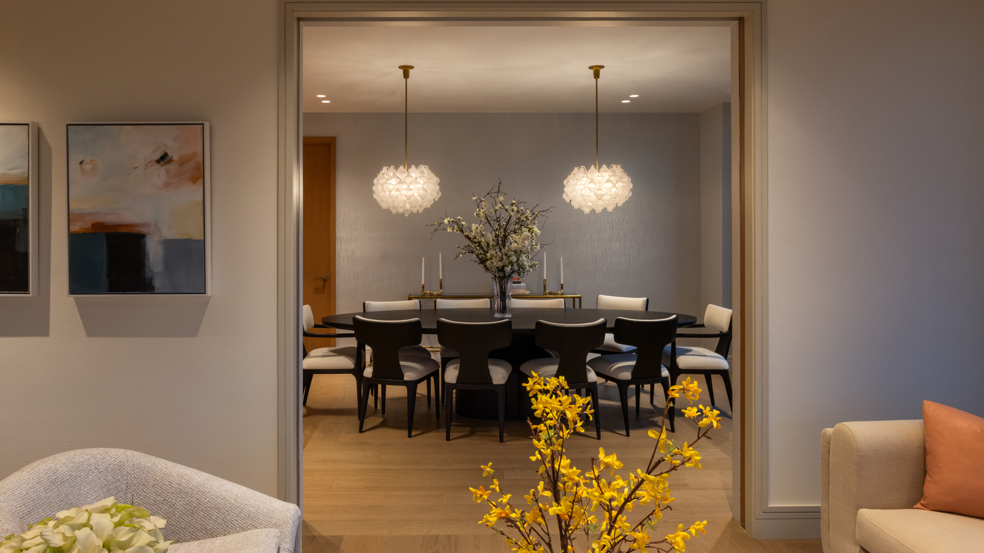 201 East 74th Street, Unit 6A Manhattan, NY 10021 - Photo 18 of 21 a view of a dining room with furniture and chandelier