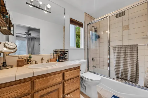 a bathroom with a shower curtain