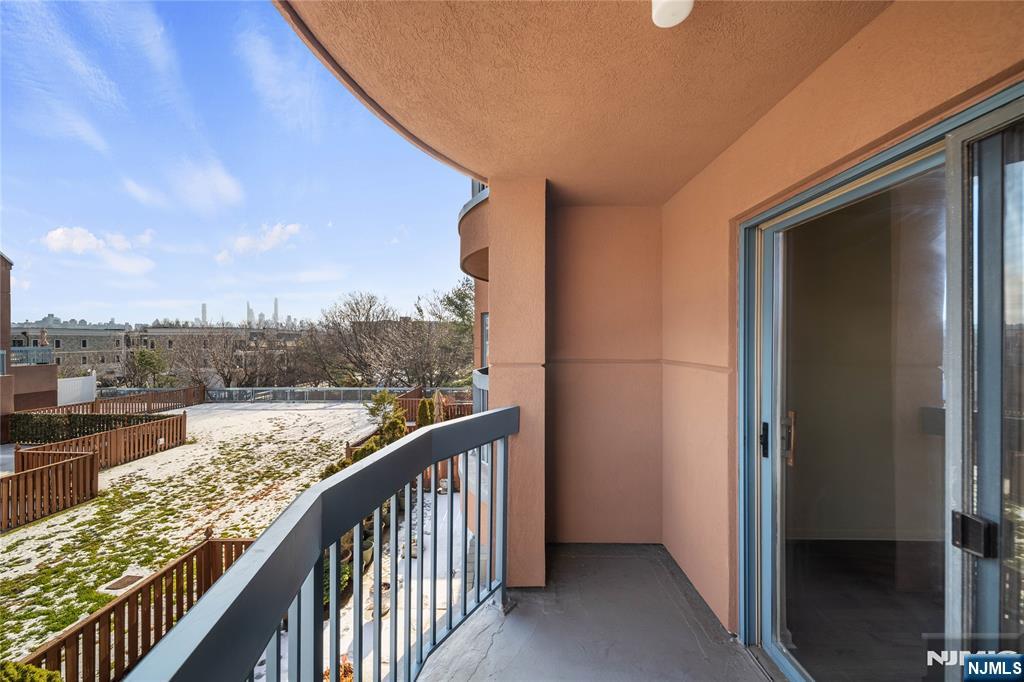 402 Chase Court, Unit 402 Edgewater, NJ 07020 - Photo 19 of 21 a view of a balcony with city view