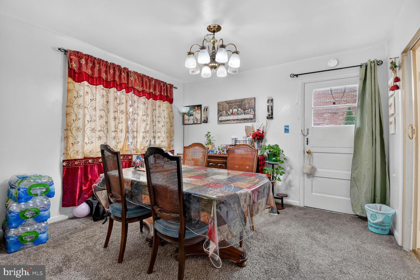 1207 Oakview Drive Silver Spring, MD 20903 - Photo 7 of 25 Cozy dining space with vibrant decor.