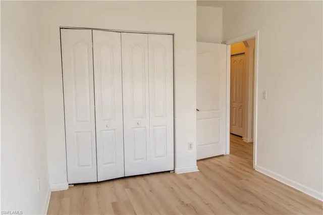 a view of a livingroom with wooden floor