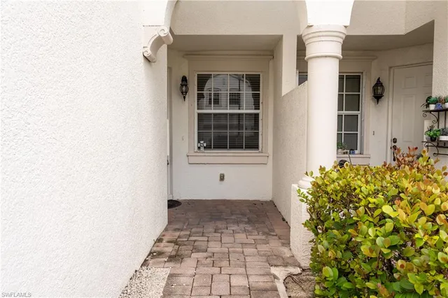 a view of a entryway door front of house