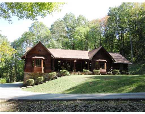 Exterior Front. 13 course WESTERN RED CEDAR LOG HOME w/D-LOGS