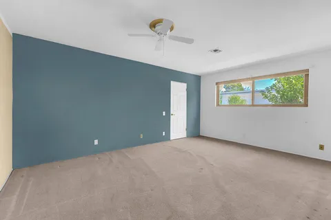 a view of a patio with a yard