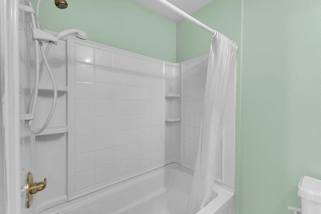 74075 Setting Sun Trail Palm Desert, CA 92260 - Photo 32 of 52 a bathroom with a shower and a toilet