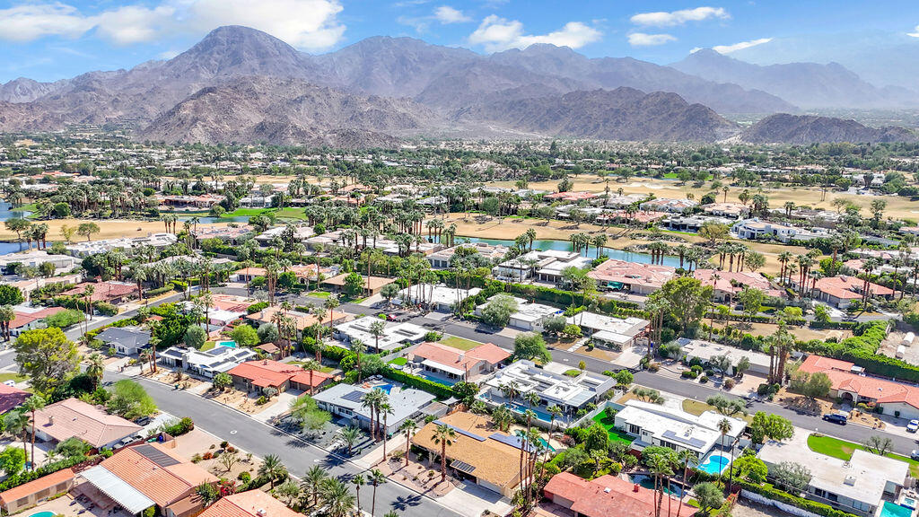 74075 Setting Sun Trail Palm Desert, CA 92260 - Photo 50 of 52 an aerial view of residential house and sandy dunes
