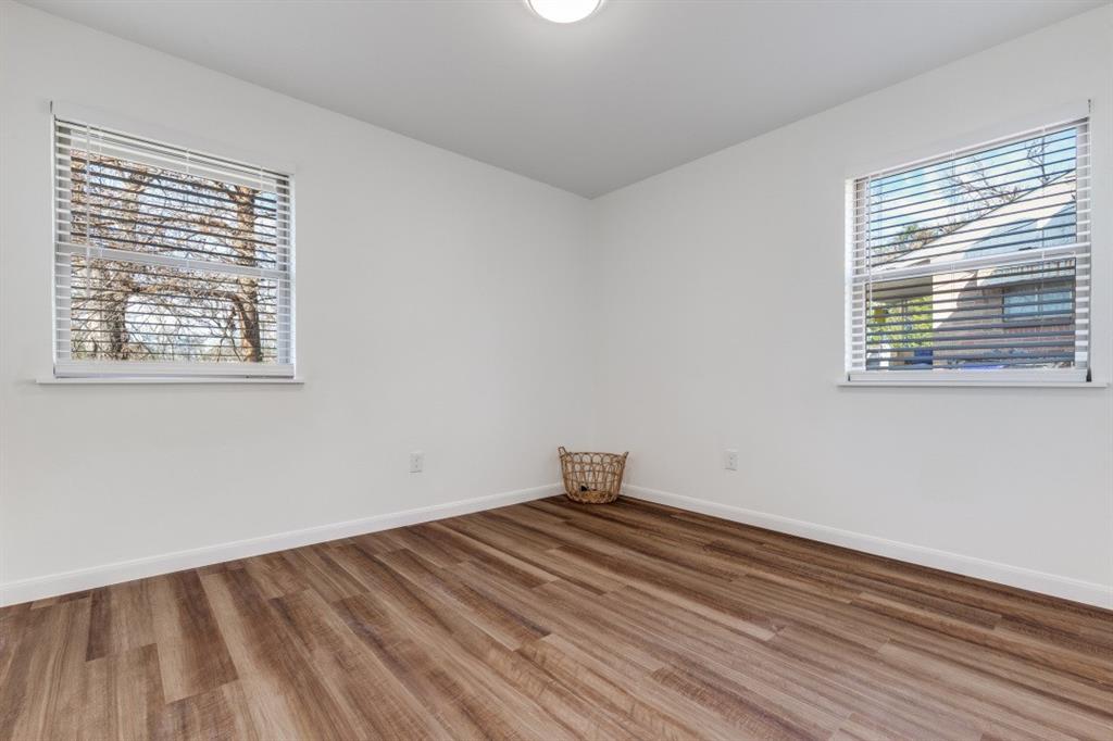 2663 Springvale Drive Farmers Branch, TX 75234 - Photo 18 of 25 a room with a bed and a window