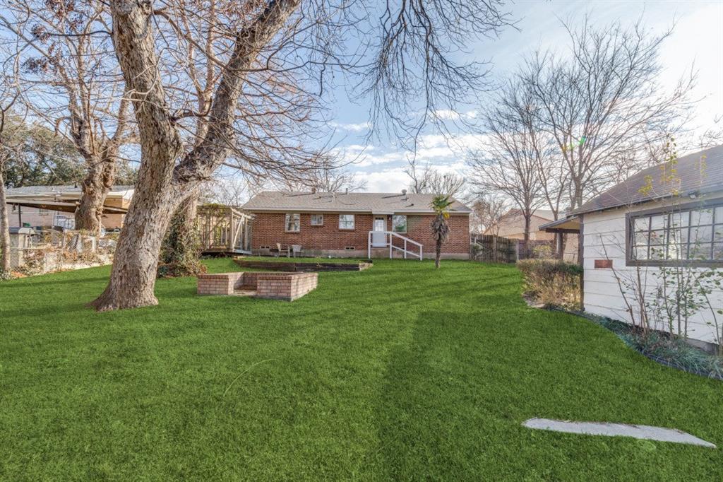 2663 Springvale Drive Farmers Branch, TX 75234 - Photo 23 of 25 a view of a house with a yard