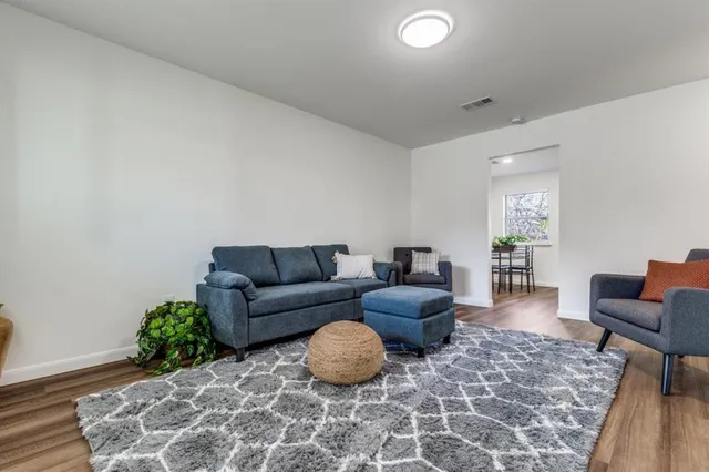 a living room with furniture and a couch