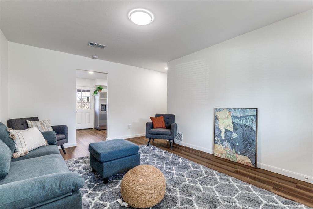 2663 Springvale Drive Farmers Branch, TX 75234 - Photo 8 of 25 a living room with furniture and a couch