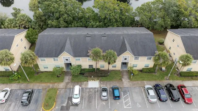 an aerial view of a house with garden