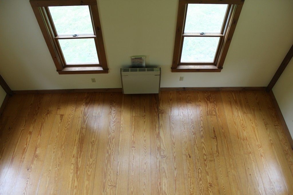 177 Number 9 Road Heath, MA 01367 - Photo 20 of 26 view of room with window and wooden floor