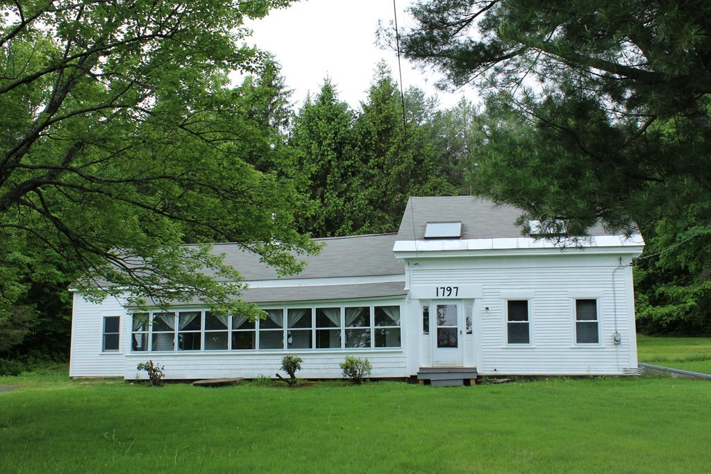 177 Number 9 Road Heath, MA 01367 - Photo 2 of 26 a view of a house with a yard and sitting area