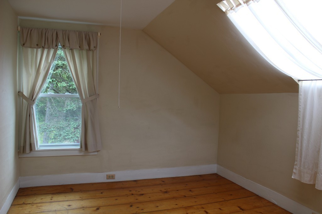 177 Number 9 Road Heath, MA 01367 - Photo 22 of 26 a view of a room that has wooden floor and a window