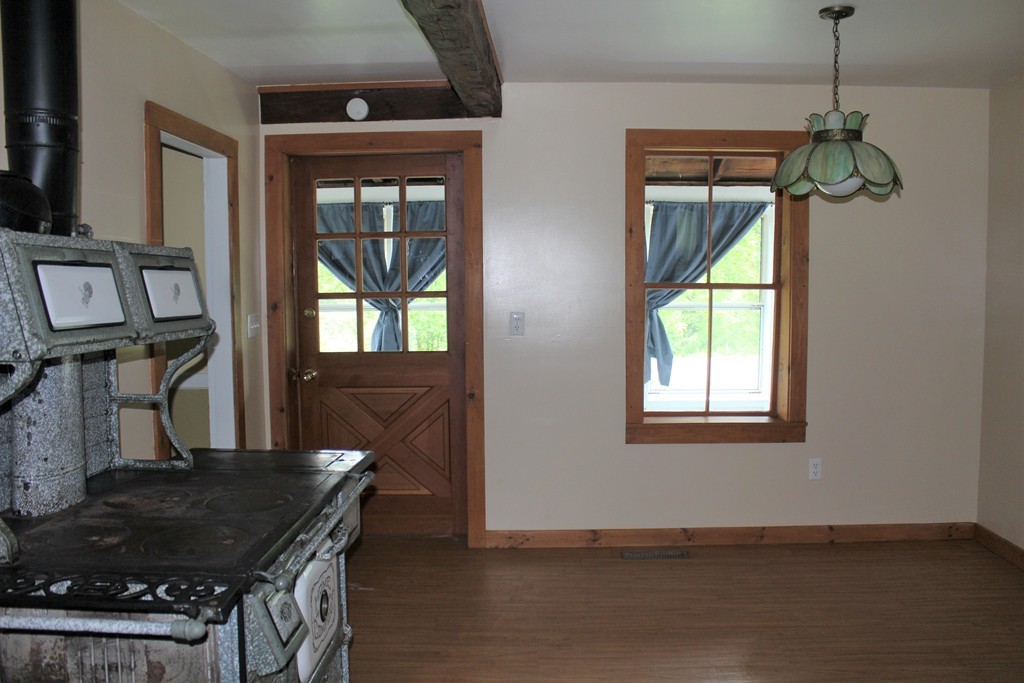 177 Number 9 Road Heath, MA 01367 - Photo 7 of 26 a kitchen that has a stove and a window