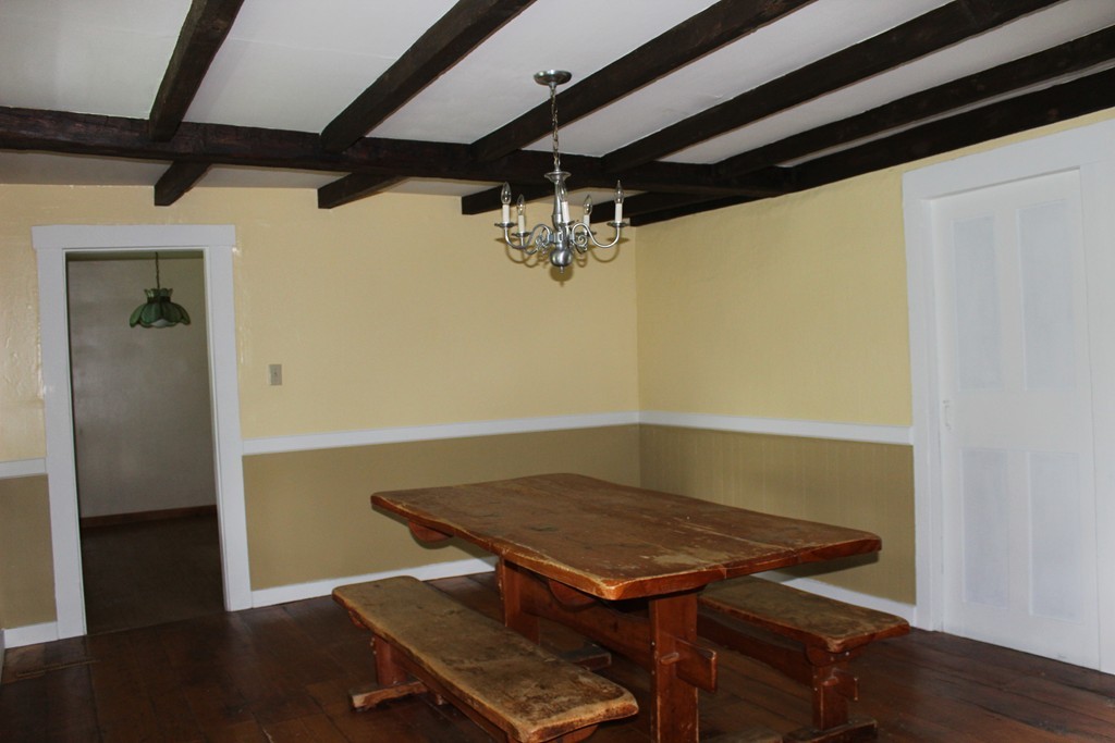 177 Number 9 Road Heath, MA 01367 - Photo 8 of 26 a view of a room with wooden floor and chandelier