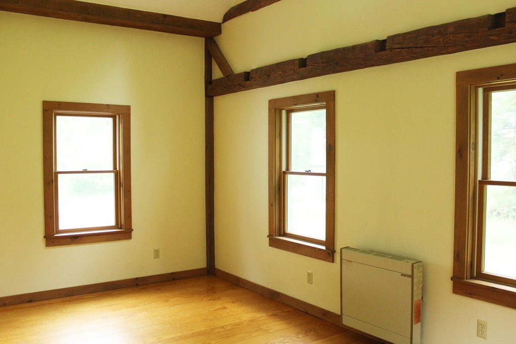 177 Number 9 Road Heath, MA 01367 - Photo 10 of 26 a view of empty room with windows