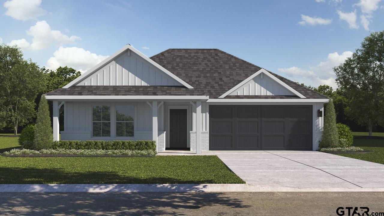 1590 Brooke Drive Tyler, TX 75702 - Photo 2 of 2 a front view of a house with a yard